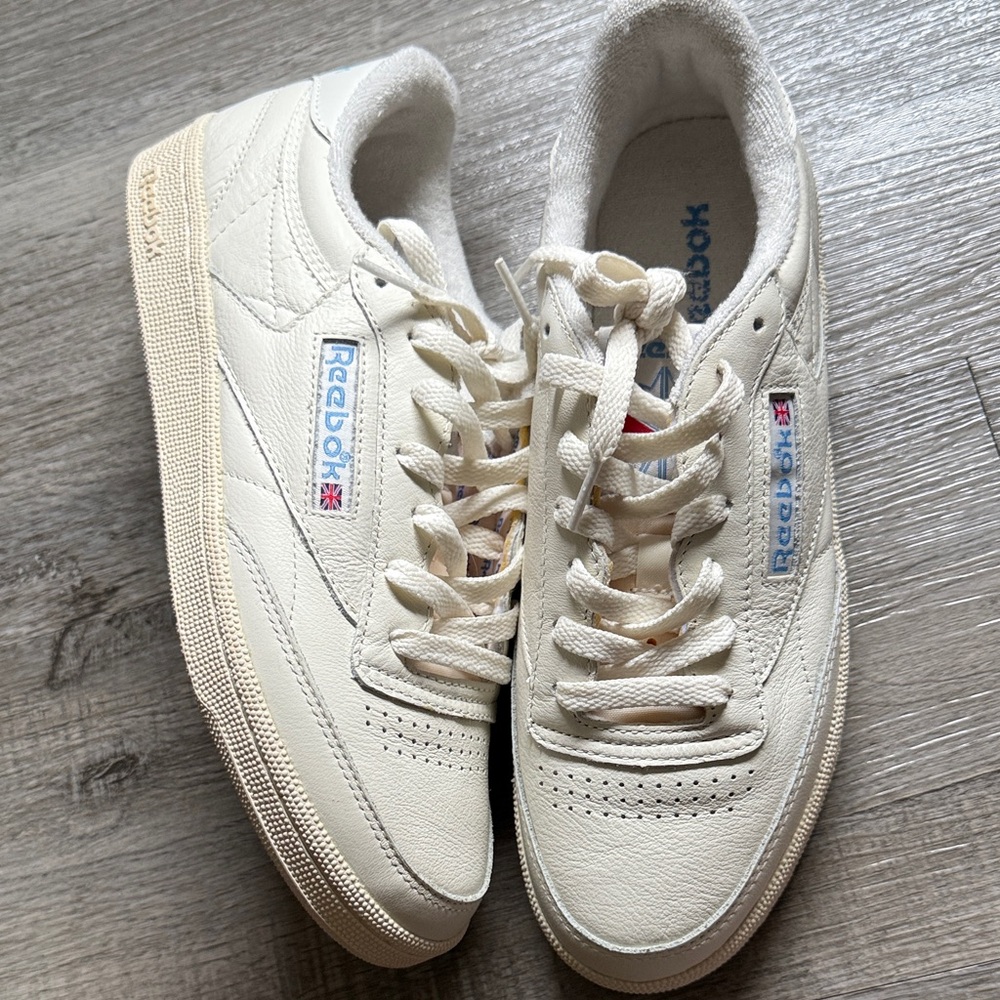 Reebok Off-White Sneakers with Blue Details
